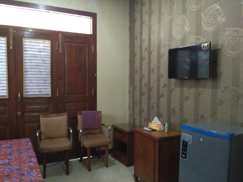 51 Wisma tamu